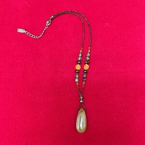 Elegant Beaded Necklace with Gold and Black Accents